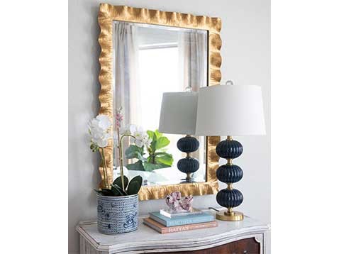 Eclectic end table with backing mirror